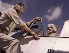 Ens[ign] Noressey and Cadet Thenics at the Naval Air Base, Corpus Christi, Texas, 1942. Creator: Howard Hollem