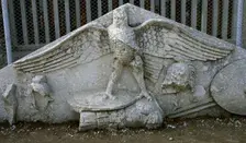 Eagle figure, armour, spear, helmet and circular shield, Roman gable, Side, Turkey, 1999. Creator: LTL