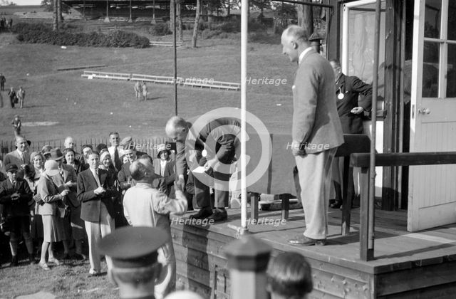 Earl Howe at the BARC Meeting, Brooklands, 25 May 1931. Artist: Bill Brunell.