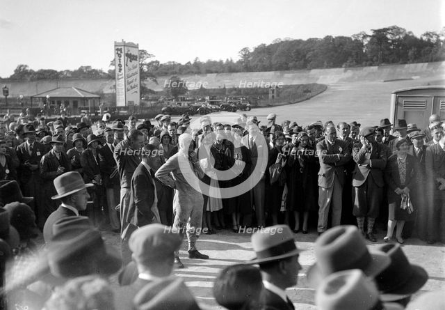Earl Howe at the BARC Meeting, Brooklands, 25 May 1931. Artist: Bill Brunell.