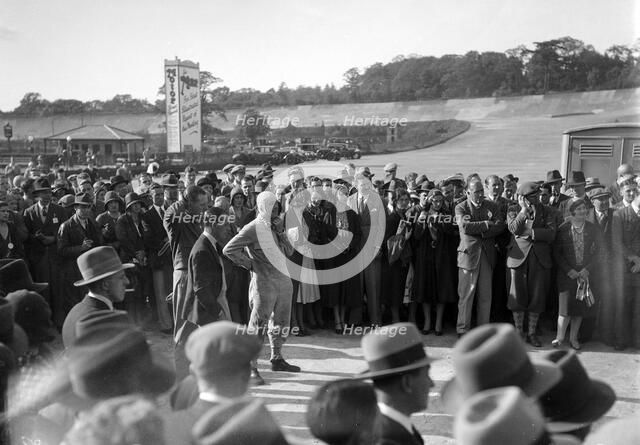 Earl Howe at the BARC Meeting, Brooklands, 25 May 1931. Artist: Bill Brunell.