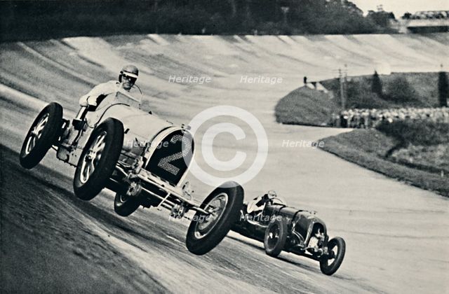 'Earl Howe and Sir Henry Birkin racing at Brooklands', 1937. Artist: Unknown.