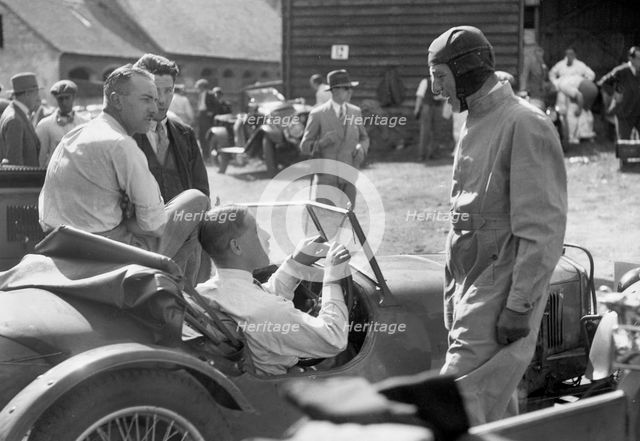 Earl Howe beside a Riley 9 Brooklands at the MAC Shelsley Walsh Hillclimb, Worcestershire, c1930s. Artist: Bill Brunell.