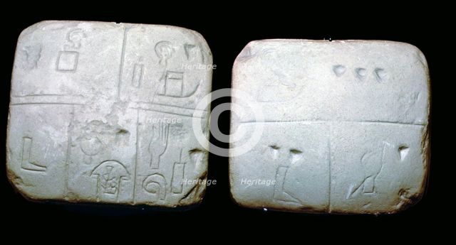 Early Sumerian stone tables, inscribed with very early archaic pictographic symbols. Artist: Unknown