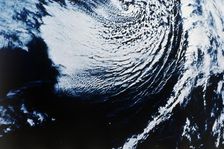Earth from space - cyclone, c1980s. Creator: NASA