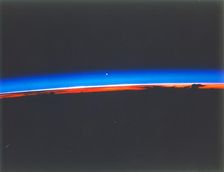 Earth with Venus rising, c1980s. Creator: NASA