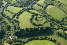 Earthwork remains of a motte and bailey castle near Powerstock, Dorset, 2014. Creator: Historic England Staff Photographer