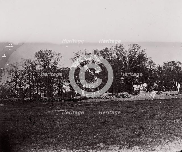 [Earthworks at the edge of a forest]. Brady album, p. 132, 1861-65. Creator: Unknown.