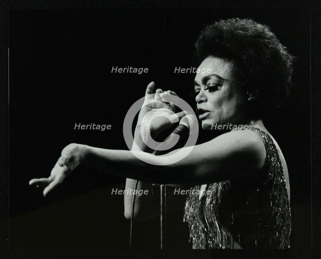 Eartha Kitt performing at the Forum Theatre, Hatfield, Hertfordshire, 20 March 1983. Her concert end Creator: Denis Williams.