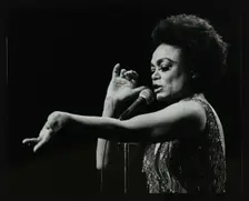 Eartha Kitt performing at the Forum Theatre, Hatfield, Hertfordshire, 20 March 1983. Her concert end Creator: Denis Williams
