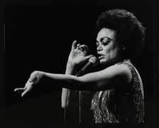 Eartha Kitt performing at the Forum Theatre, Hatfield, Hertfordshire, 20 March 1983. Her concert end Creator: Denis Williams