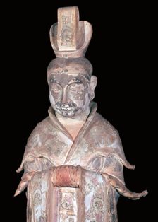 Earthenware Chinese figure of a tomb attendant, 7th century