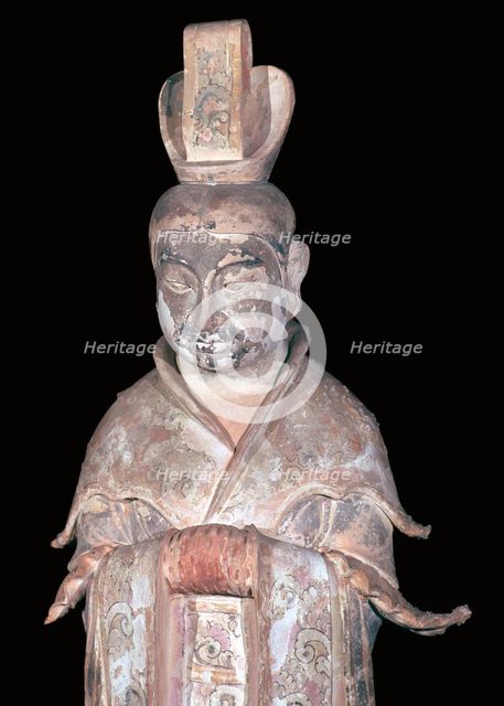 Earthenware Chinese figure of a tomb attendant, 7th century. Artist: Unknown