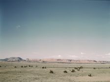East bound track of the Santa Fe R.R. across desert country near South Chaves, New Mexico, 1943. Creator: Jack Delano