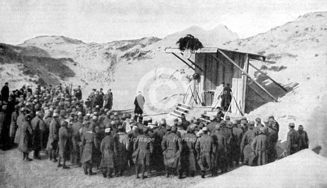 Easter mass in the dunes on the beaches of Belgium by the North Sea, World War I, 1915. Artist: Unknown