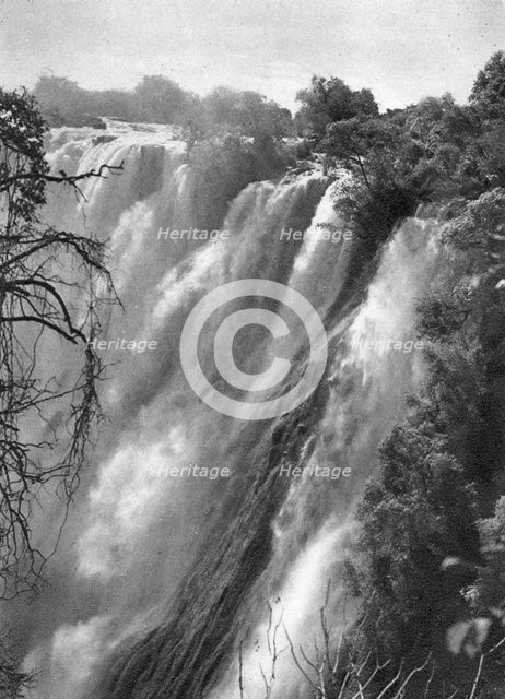 Eastern cataract, Victoria Falls, Livingstone to Broken Hill, Northern Rhodesia, 1925 (1927).  Artist: Thomas A Glover