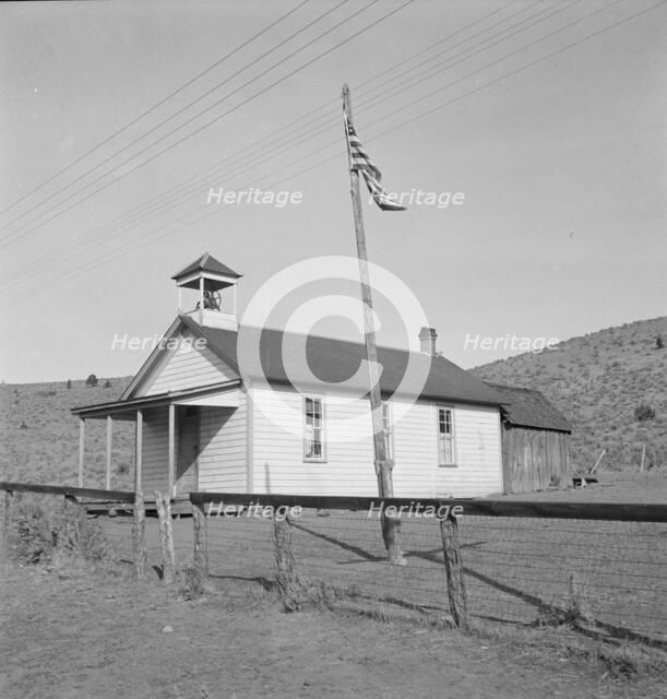 Eastern Oregon county school in clearing in the sage bush, Baker County, Oregon, 1939. Creator: Dorothea Lange.