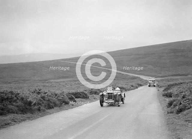 EC Haesendonck's MG PB competing at the MCC Torquay Rally, July 1937. Artist: Bill Brunell.