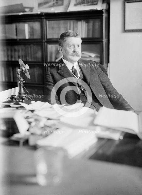 Edward B. Moore, Commissioner of Patents - At Desk, 1912. Creator: Harris & Ewing.