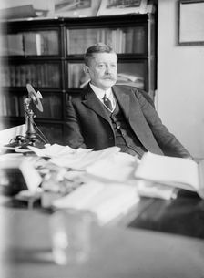 Edward B. Moore, Commissioner of Patents - At Desk, 1912. Creator: Harris & Ewing