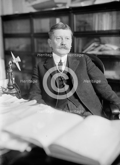 Edward B. Moore, Commissioner of Patents - At Desk, 1912. Creator: Harris & Ewing.
