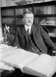 Edward B. Moore, Commissioner of Patents - At Desk, 1912. Creator: Harris & Ewing