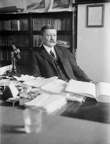 Edward B. Moore, Commissioner of Patents - At Desk, 1912. Creator: Harris & Ewing
