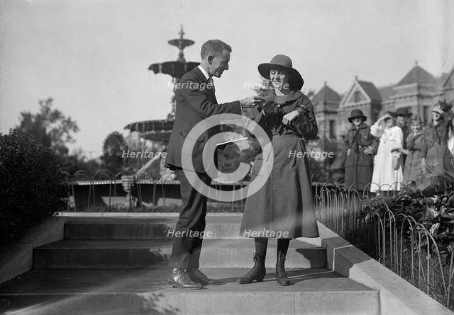 Edwards, Russell T., with Helen Tew, Girl Scout, 1917. Creator: Harris & Ewing.
