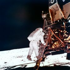 Edwin Buzz Aldrin descends the steps of the Lunar Module ladder to walk on the Moon, 1969.Artist: NASA