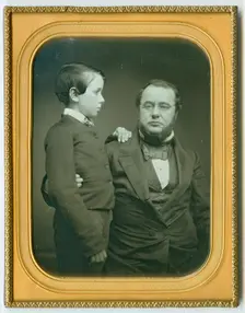 Edwin McMasters Stanton, seated, with his son Edwin Lamson Stanton, between 1852 and 1855. Creator: Unknown