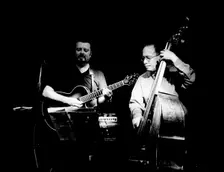Eddie Gomez and Martin Taylor, Ronnie Scott's, London, July 2000. Artist: Brian O'Connor