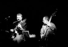 Eddie Gomez and Martin Taylor, Ronnie Scott's, London, July 2000. Artist: Brian O'Connor