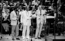 Eddie Daniels, C Terry and John Dankworth, Barbican, London, 1986. Creator: Brian O'Connor