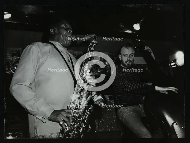 Eddie 'Lockjaw' Davis and Jim Richardson playing at The Bell, Codicote, Hertfordshire, 1982. Creator: Denis Williams.