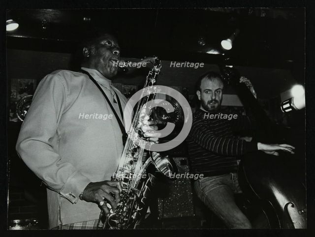 Eddie 'Lockjaw' Davis and Jim Richardson playing at The Bell, Codicote, Hertfordshire, 1982. Artist: Denis Williams