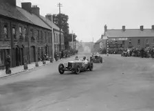 Edgar Maclure's Riley leading Tim Birkin's Alfa Romeo, RAC TT Race, Ards Circuit, Belfast, 1932. Artist: Bill Brunell