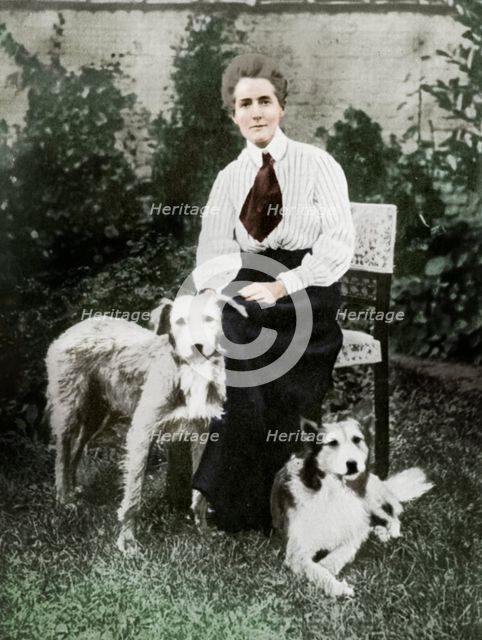 Edith Cavell with her pet dogs, c1915. Artist: Unknown.