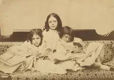 Edith, Ina and Alice Liddell on a Sofa, Summer 1858. Creator: Lewis Carroll