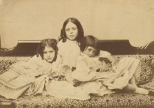 Edith, Ina and Alice Liddell on a Sofa, Summer 1858. Creator: Lewis Carroll