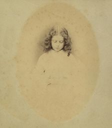 Edith Liddell Seated Beside a Vase of Foxgloves, 1860. Creator: Lewis Carroll