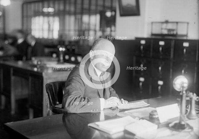 Edmund W. Bonnaffon, Pay Inspector, Navy Yard - At Desk, 1916. Creator: Harris & Ewing.