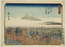 Edo Bridge and Nihon Bridge in the Eastern Capital (Toto Edobashi Nihonbashi), from the se..., 1852. Creator: Ando Hiroshige