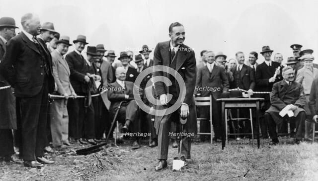 Edsel Ford turning the first sod at the site of Ford's plant at Dagenham, Essex, late 1920s. Artist: Unknown