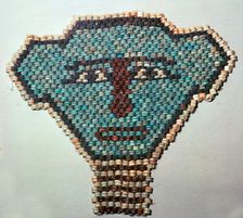 Egyptian beadwork face, 2nd century BC