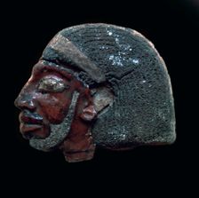 Egyptian glazed relief of a Nubian slave