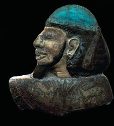 Egyptian glazed relief of a Phoenician slave