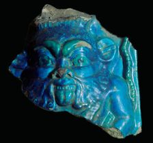 Egyptian faience head of Bes