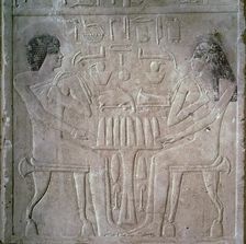 Egyptian funerary stele of a Royal Priest and his wife. Creator: Unknown