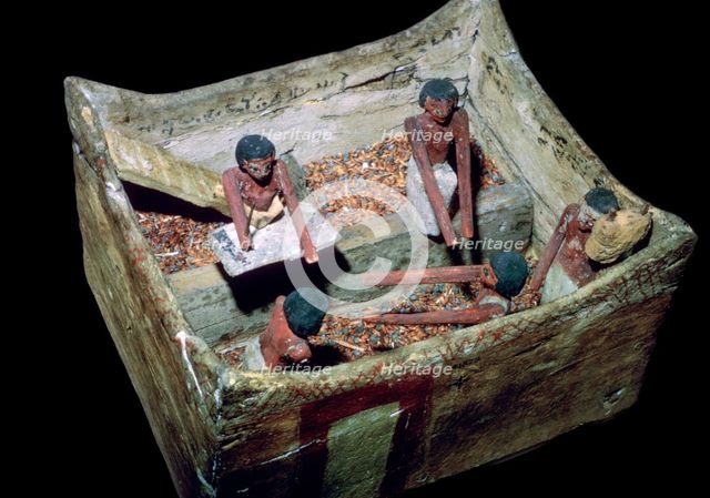 Egyptian model of workers in a grain store. Artist: Unknown