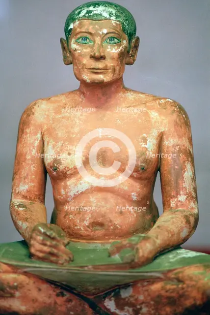 Egyptian seated scribe model. Artist: Unknown